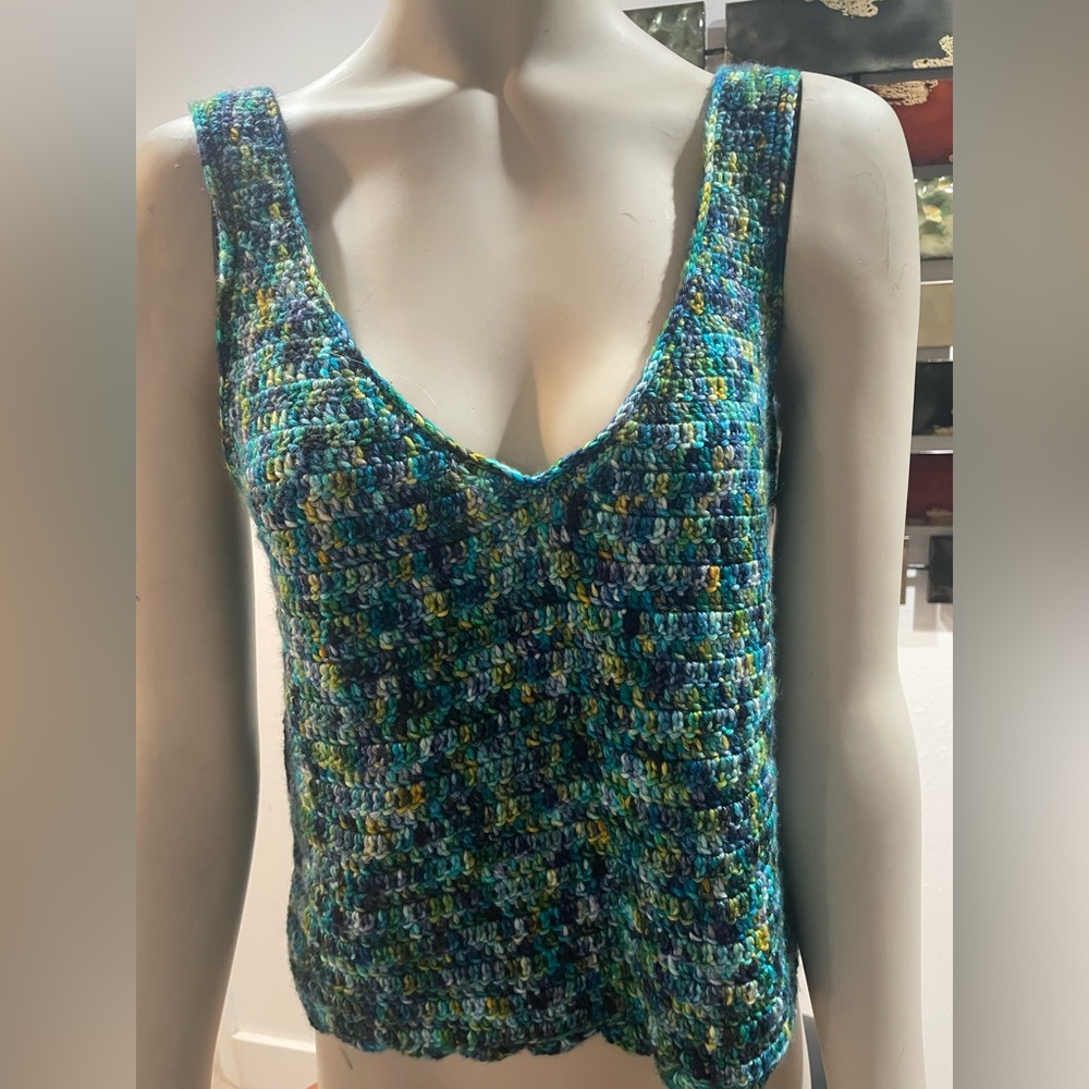 HANDKNIT sleeveless tank! Soft,soft,soft quality yarn.Not sure the type of yarn